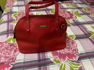 CAPRESE Red Sling Bag With Detachable Strap
