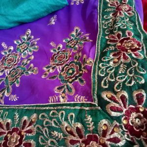 Embroidered Purple Saree with Green Blouse
