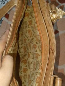 Stylish Tan Shoulder Bag with Scarf Accent