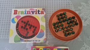 Brainvita Game With Snakes & Ladder board