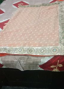 Stunning Orange Embroidered Saree
