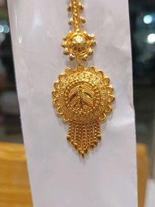 gold plated tika