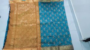Elegant Teal Saree with Gold Motif
