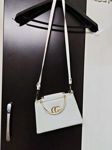 Chic White Handbag with Gold Accent