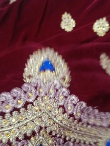 maroon and royal blue embellished saree
