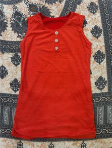 Vibrant Orange Kurti with Embellished Buttons