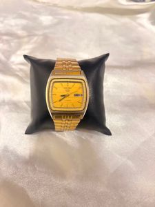 vintage seiko 5 and omex wtach