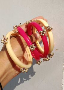 Set of 4 Elegant Bangles with Pearl & Stone Embell