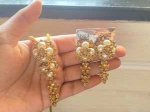 Neckpiece, earrings, ring, chain