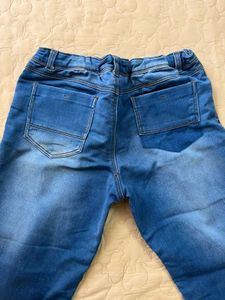 Distressed Blue Denim Jeans