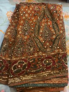 Exquisite Embellished Orange Saree