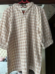 Chic Checkered Top with Ruffled Neck