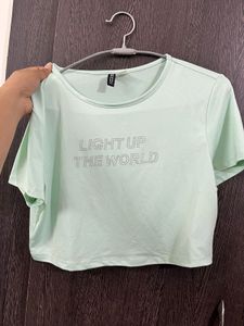 H&M Light Up The World Crop Top