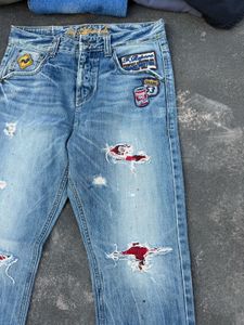 Distressed Patch Jeans