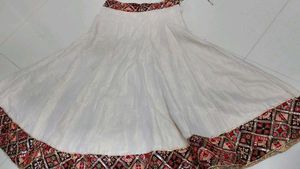Elegant White Lehenga with Embellished Border