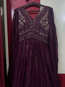 brand new Embellished gown with falling sleeves