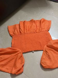 Orange Puff Sleeve Peplum Top