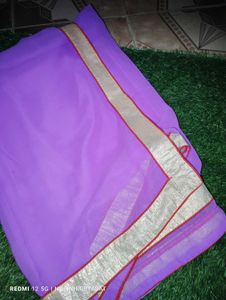 Beautiful Purple saree with Golden Border