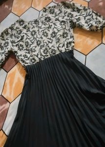 Elegant Floral Print Gown with Pleated Skirt