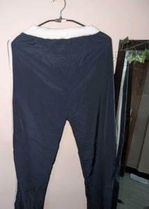 Blue Athletic Pants with White Stripes