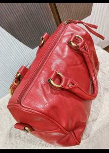 Chic Red Leather Handbag with Tassel