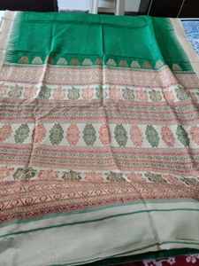 Beautiful Green Saree with Intricate Patterns