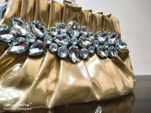 Golden Clutch With Big Diamonds