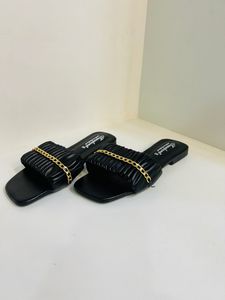 brand new black flip flops