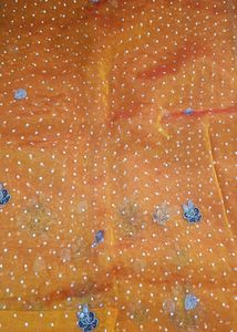 Elegant Orange Saree with White Polka Dots