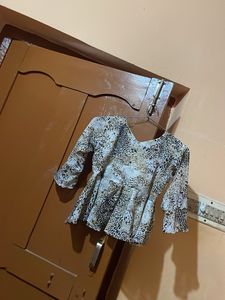 Chic Animal Print Peplum Top