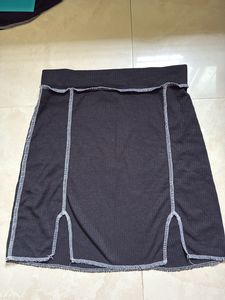 black skirt and top