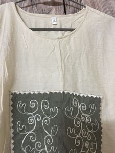Cream top with Embroidered Patch