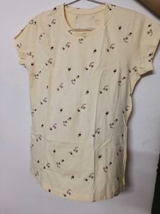 Peach coloured short sleeved tshirt