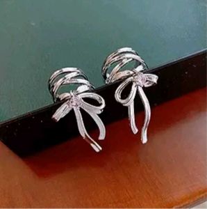 Unique Silver Bow Ear Cuff &amp; Stud Set