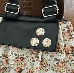 Chic Floral Handbag with Black Accents