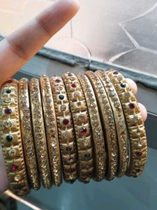 Set of Elegant Gold Bangles with Stones