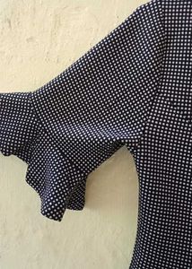 polki dots v neck shape stretchable top in black c