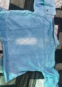 Light Wash Denim Jacket with Distressed Details