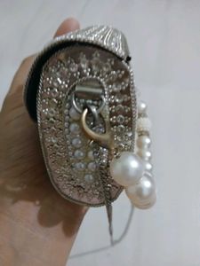Elegant Pearl Embellished Clutch from Snatcher