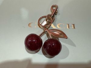 Coach Cherry charm