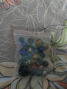Bag of colorful glass marbles