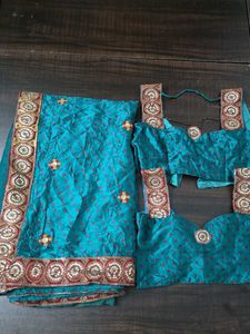 Teal Saree with 2 sleevless Blouse