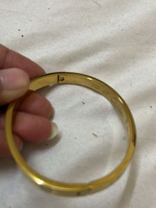 Elegant Gold Bangle with Crystals
