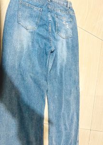 Distressed Blue Denim Jeans