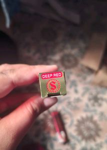 it is maroon and deep red shringar bindi stick
