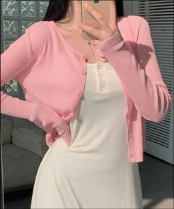 Ribbed Pink Knit Cardigan with White Dress
