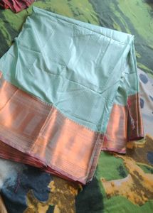 Elegant Turquoise Saree with Gold Border