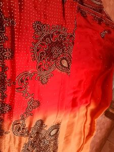 Elegant Red Saree with Crystal Embellishments