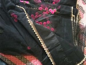 Elegant Black Saree with Pink Floral Print