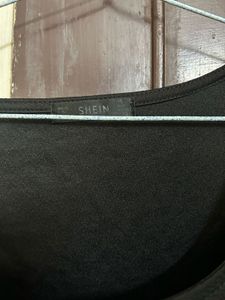 Chic Black Dress with Sheer Puff Sleeves